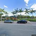 Young woman sick at kids park bench in Fort Lauderdale