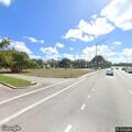 Officer checks white Volkswagen on Sunrise Lake Drive