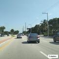 Driver weaving through traffic at low speed