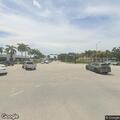 Motorcycle crash with injured driver on Pine Ridge Rd