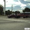 Police standing by with white GMC truck