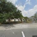 Loose pit bull reported in residential yard