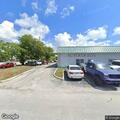Traffic crash involving black Ford Fusion