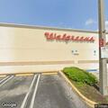 Partially undressed person at Walgreens entrance