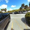 Person unconscious and fainting at beach parking lot