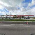 Report of woman displaying weapon at gas station