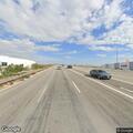 Disabled black sedan in FasTrak lanes on 15