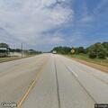 Officer with stopped truck on Highway 72