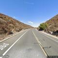 Large debris blocking lane on West San Dimas Avenue