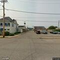 Male sleeping in alley on Baker Avenue checked