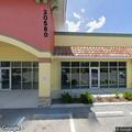 Two people fighting outside Port Charlotte business
