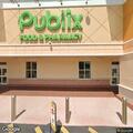 Traffic stop of blue pickup at Publix parking lot