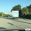 Truck pulling trailer with no tag on Palmer and Bell