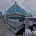 Firefighter falls into water during fire at Marina Plaza
