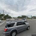 Woman hitting male driver in moving pickup truck