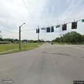 Red SUV stopped in roadway at 301 Boulevard