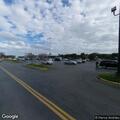 Minor crash between truck and car in parking lot