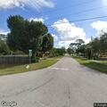 Intoxicated man on electric bike with whiskey bottle