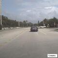 Car crosses double yellow and stops at 7-Eleven