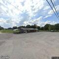Driver slumped over in running truck at Wimauma business