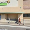Woman pulls man off bicycle behind Walmart