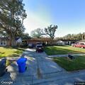 Muffled 911 call with background noise at residence