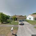 Caller reports person seen in backyard