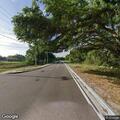 Traffic stop involving black Lexus sedan