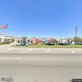 Officer stops vehicle at Cadillac dealership