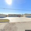 Man wandering inside laundromat in Odem