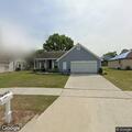 Person banging on door at Brandon home