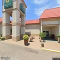 Person experiencing chest pains at La Quinta Inn