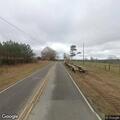 Bale of hay blocking lane on County Road 32