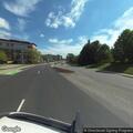 Elderly man having trouble standing at roadside