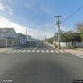 Person with possible broken hand at bus stop