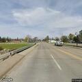 Reckless red pickup speeding on US-23 near Omer