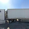 Rear-end crash at truck stop causes back pain