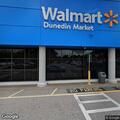 Traffic stop on red Jeep in Walmart lot
