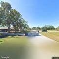 Barbecue grill fire under porch near mobile home