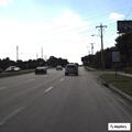 Green truck swerving and hitting curb on Tampa Road