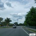 Disabled vehicle with flat tires on South Mobley Road