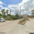 Semi truck hits building in Clermont parking lot