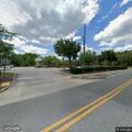 Homeless person with severe back pain at library