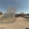 Grass fire in front of South Edwards residence