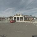 Vehicle stuck on cement at credit union parking lot