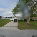 Person experiencing severe abdominal pain in Deltona