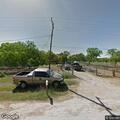 Neighbor piling dirt in road creates traffic hazard