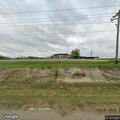 Officer stops vehicle at livestock exchange