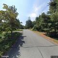 Landscaper vehicles blocking lane on Deer Meadow Lane