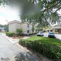 Person experiencing abdominal pain in DeLand